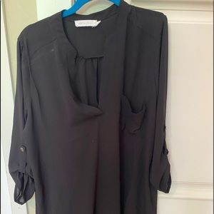 Stylish Black long flowy blouse .